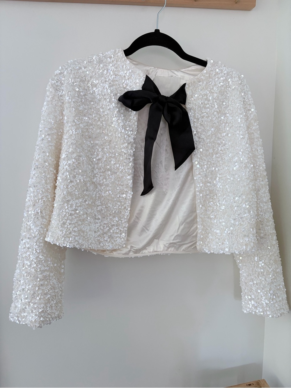 H&M White Sequin Cropped Jacket with Black Bow